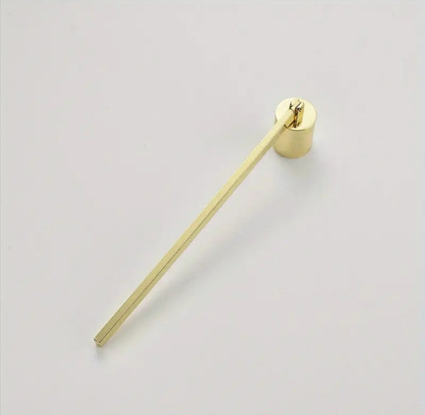 Candle snuffer in gold color