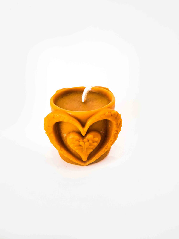 Cylindrical candle with two hearts