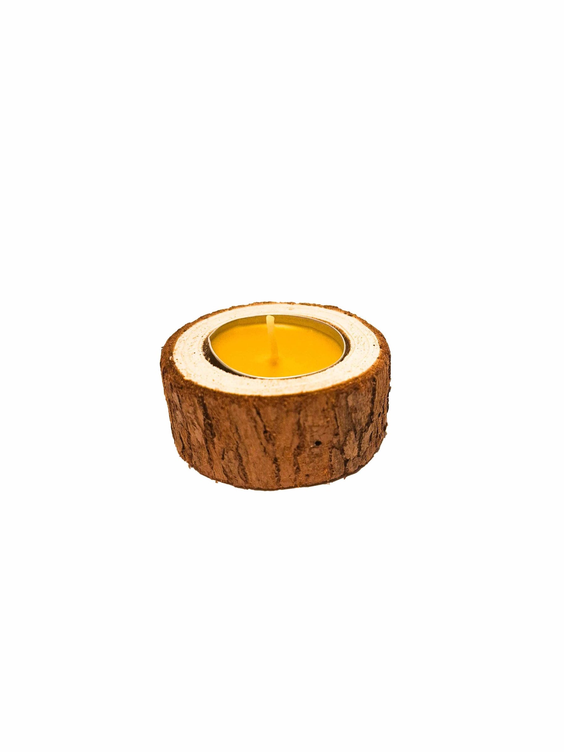 Tea candle in wood in a box