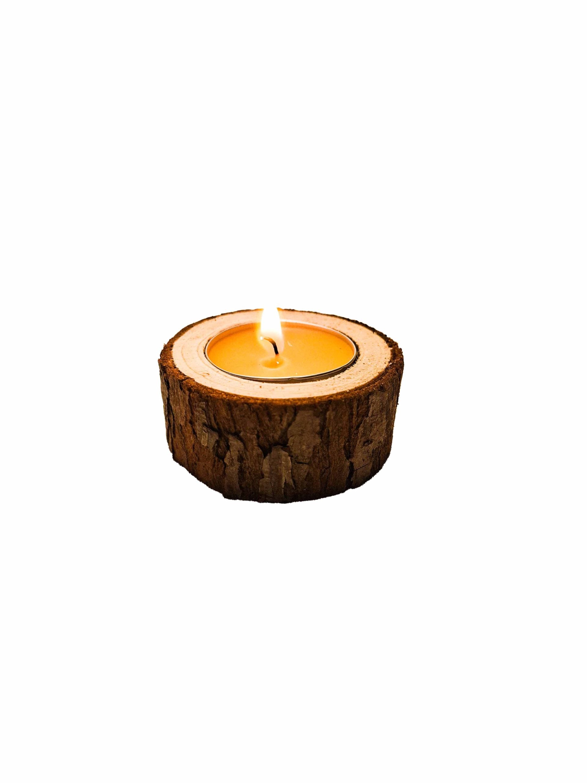 Tea candle in wood in a box