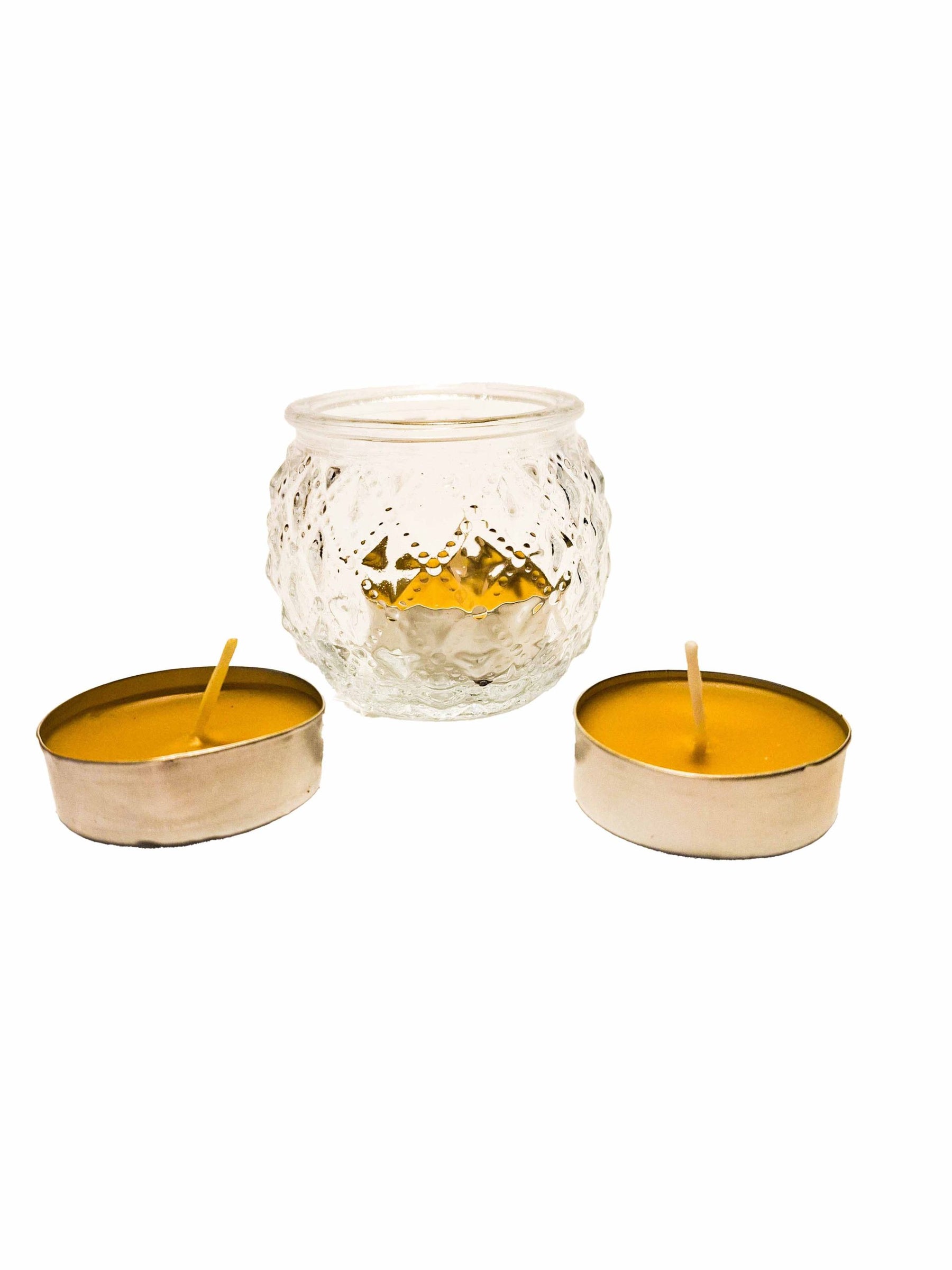 Tea candle in round glass in a box