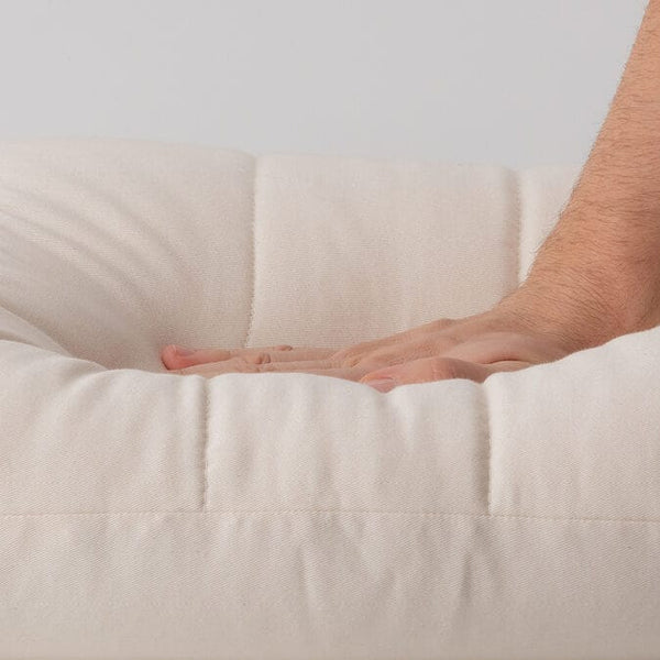 Anatomsko ergonomski vzglavnik Dioces z mikromasažnim polnilom iz prosa. Kakovostno in narejeno v Sloveniji. Proti smrčanju in bolečinam.