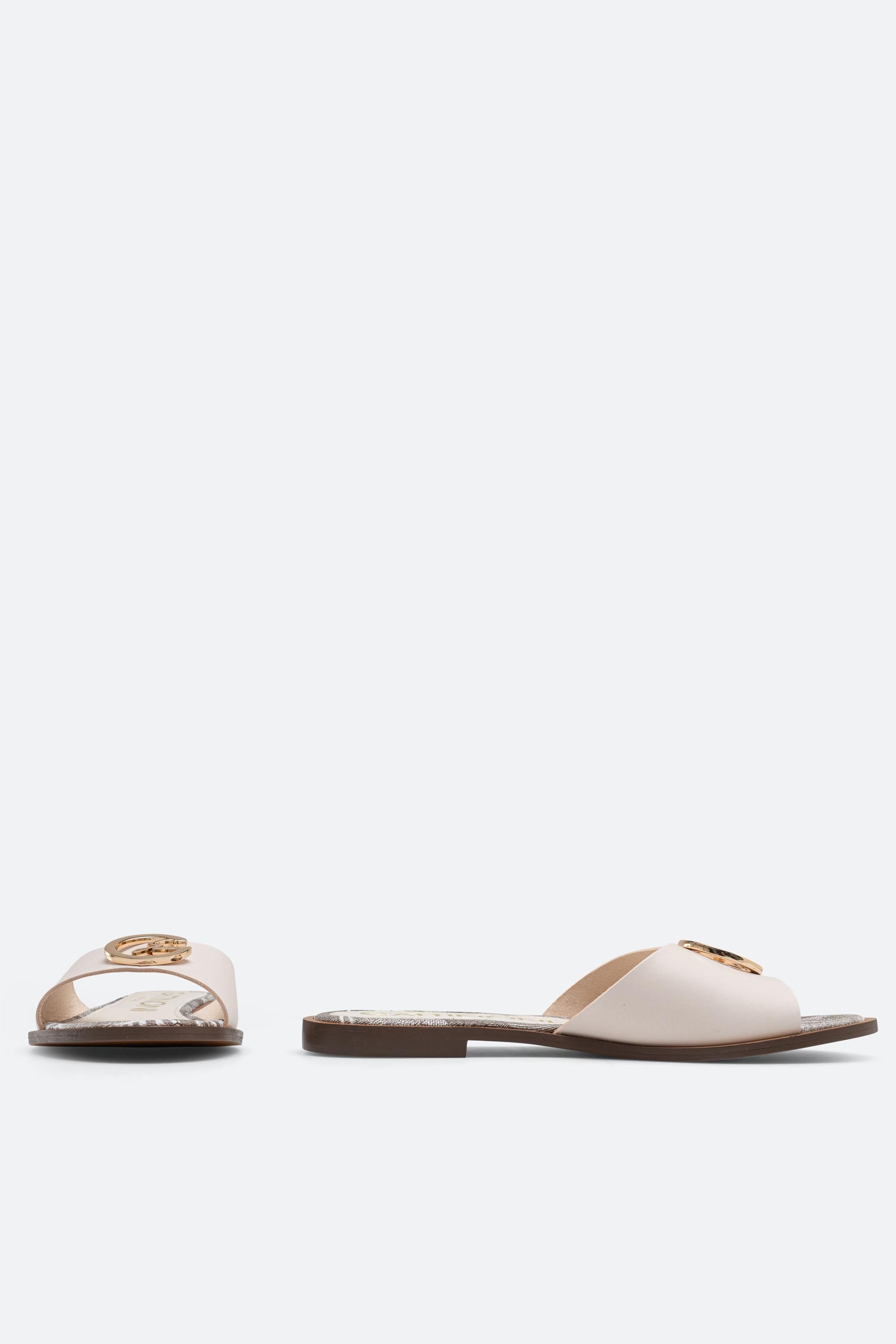 White leather slipper with plaque detail