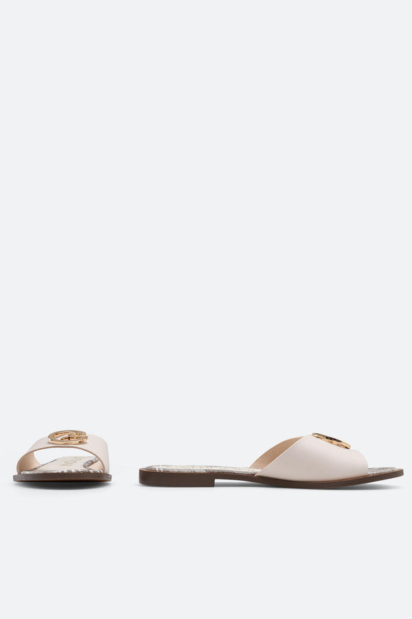 White leather slipper with plaque detail
