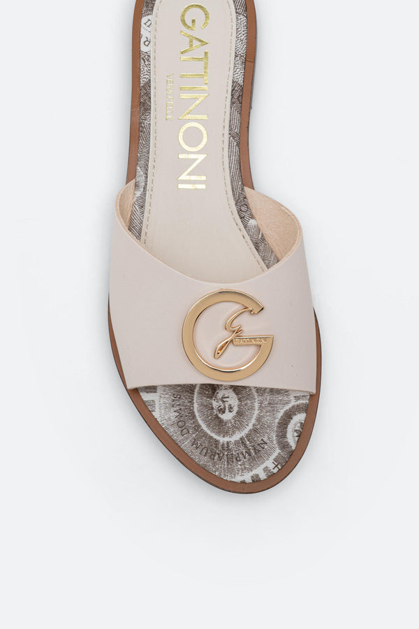 White leather slipper with plaque detail