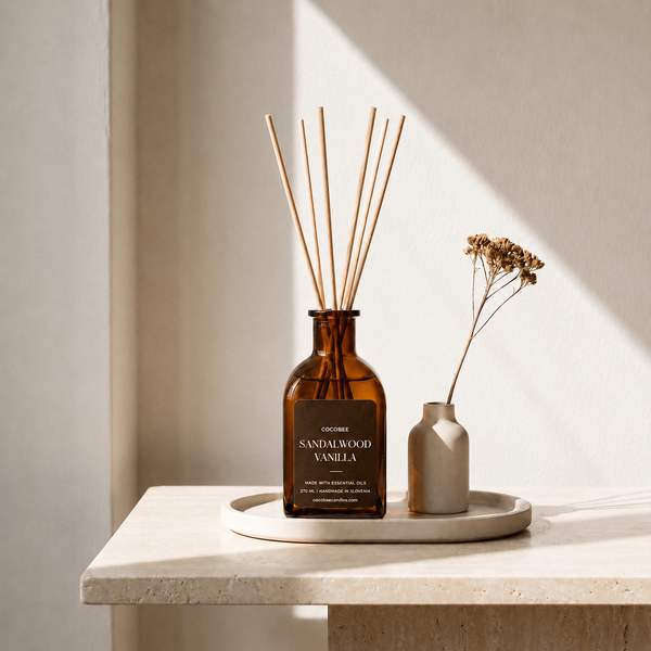 CocoBee reed diffusers in amber bottles with natural reeds