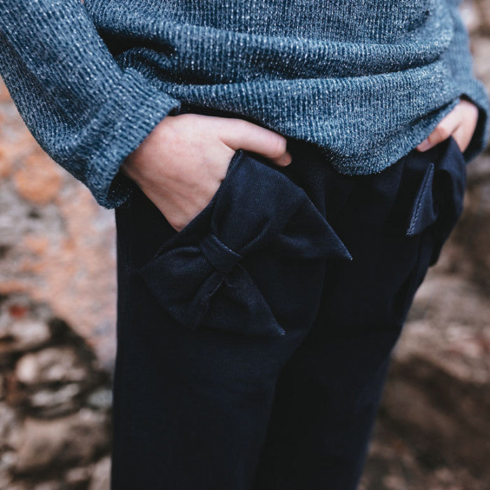 PANTS WITH BOWS