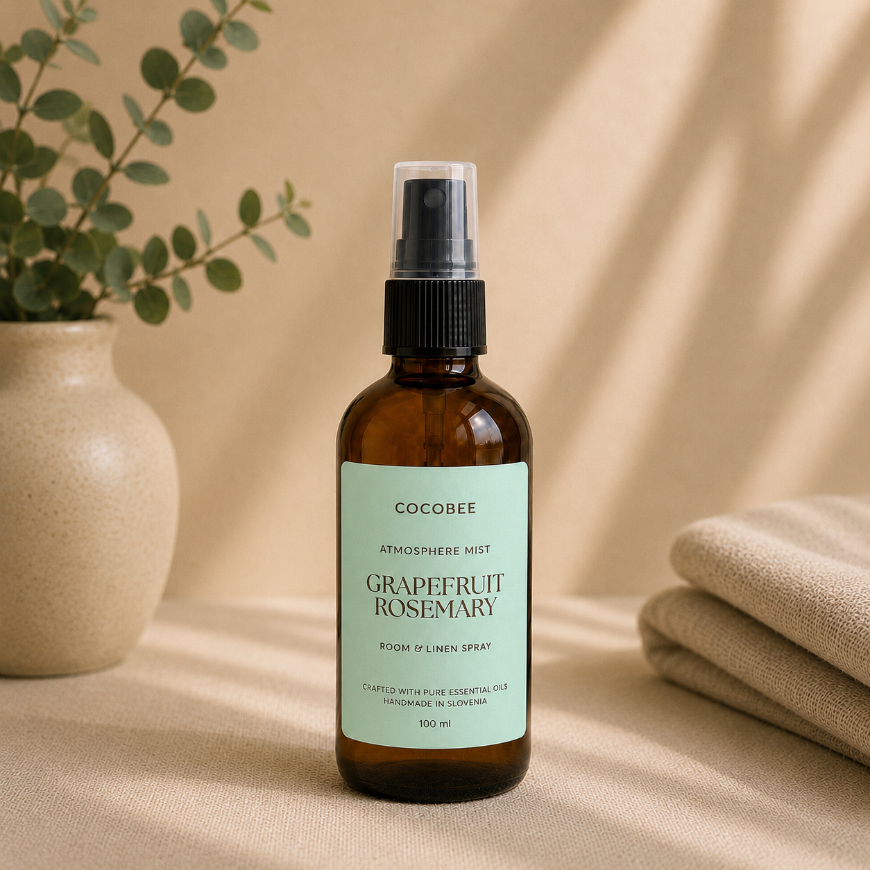 CocoBee Grapefruit Rosemary Atmosphere Mist in an amber spray bottle