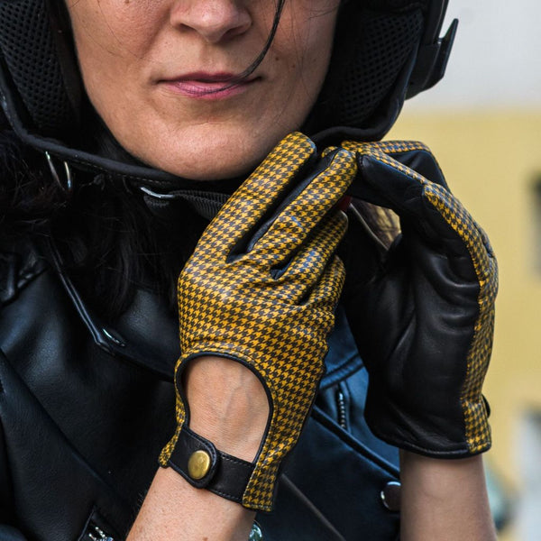 Luxury women's yellow-black gloves with a houndstooth pattern and gold snap