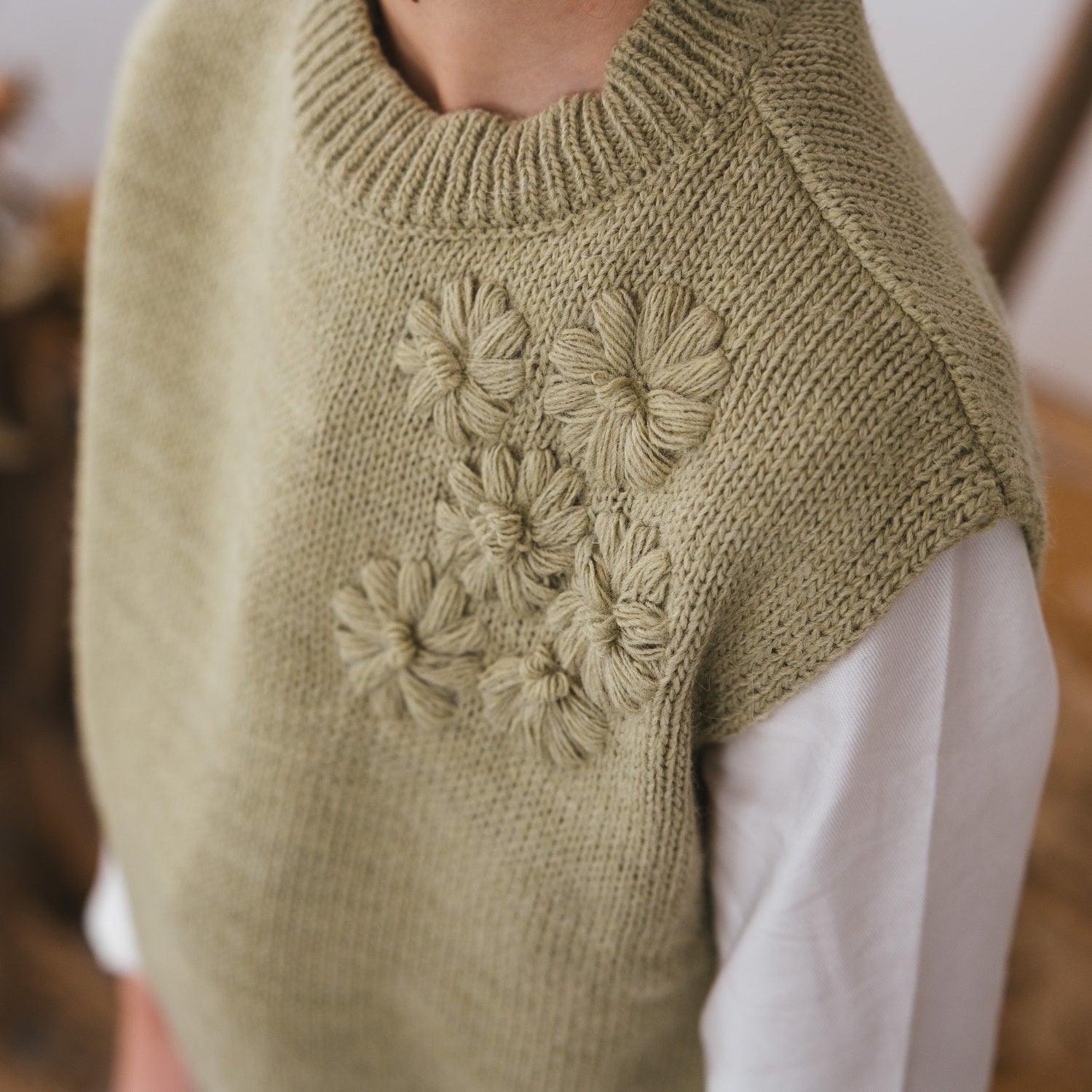 VEST WITH FLORAL EMBROIDERY