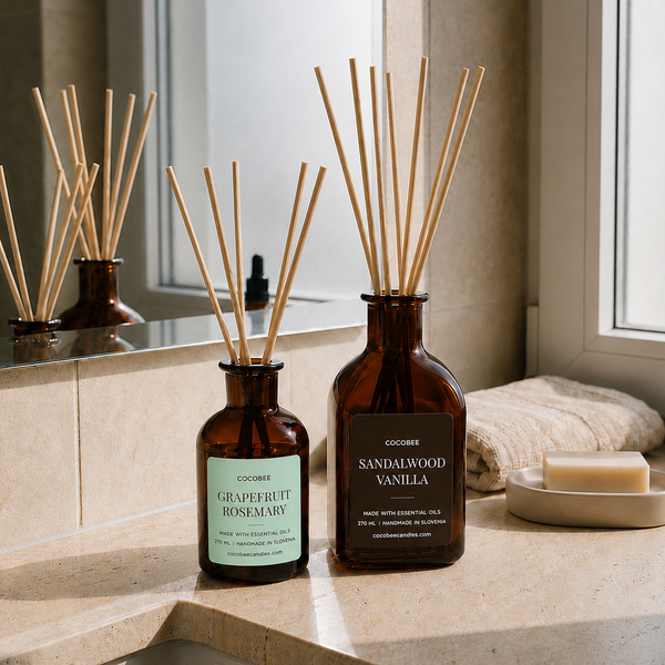 Grapefruit Rosemary and Sandalwood Vanilla CocoBee reed diffusers in a bathroom