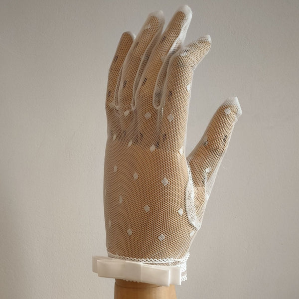 Social textile gloves with a bow