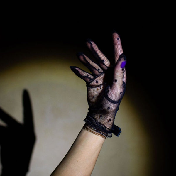Social textile gloves with a bow