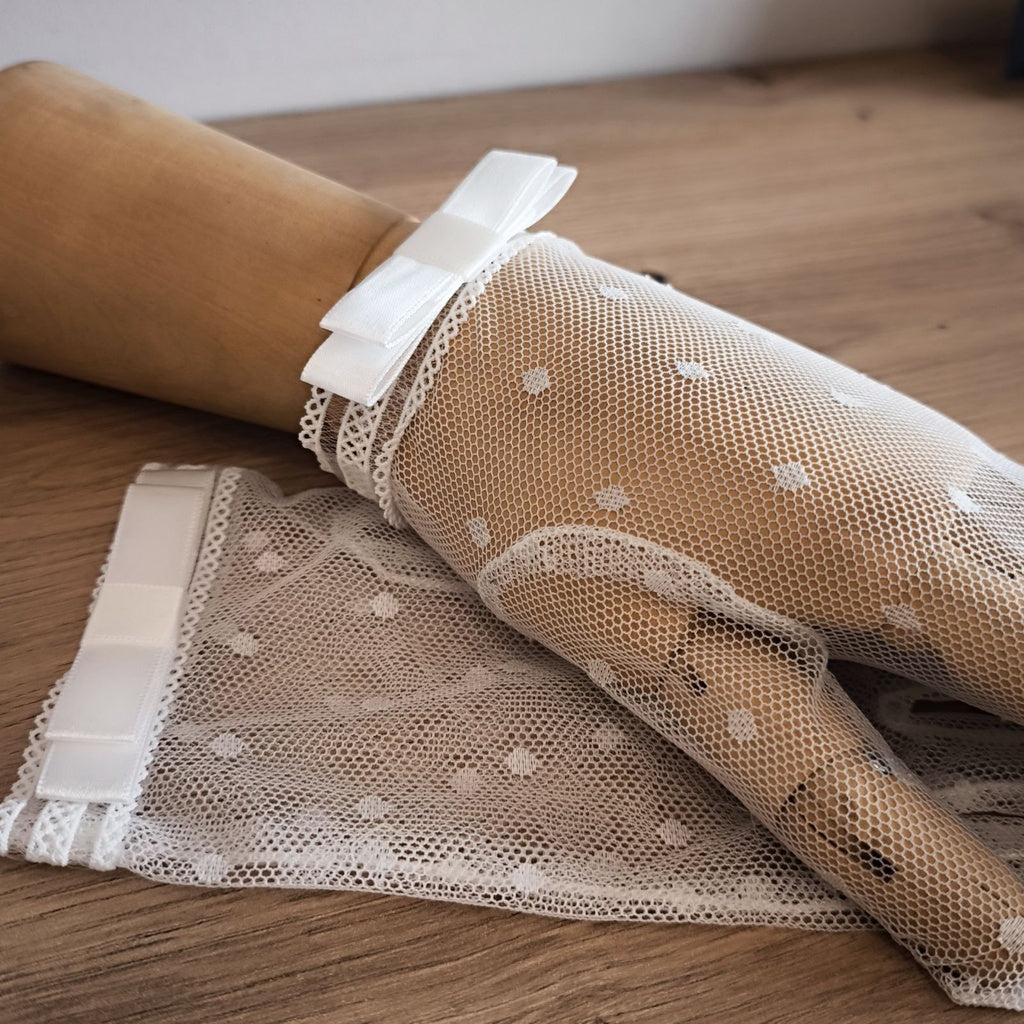 Social textile gloves with a bow