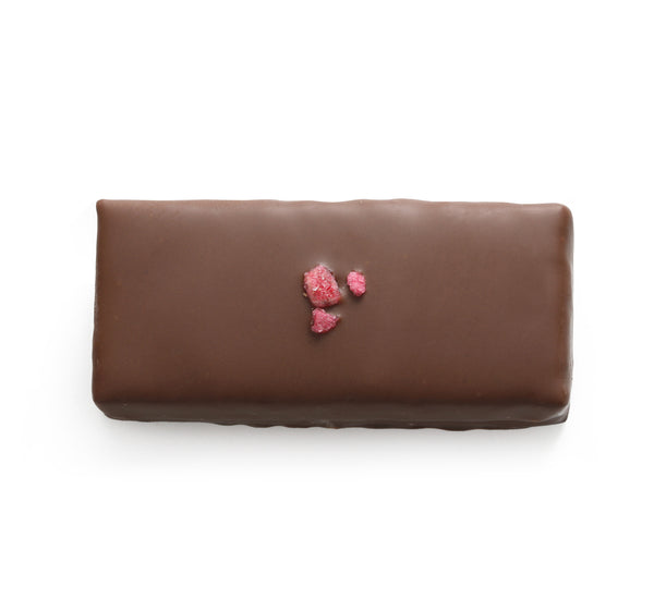 Raspberry ganache chocolate lychee fruit paste bite