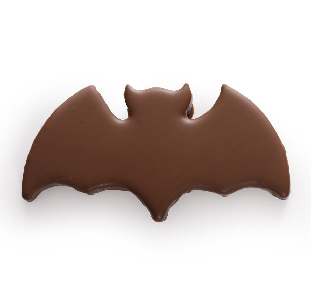 Trattamento di Halloween con pralina di cioccolato al latte frizzante a forma di pipistrello
