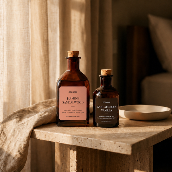 Jasmine Sandalwood and Sandalwood Vanilla CocoBee reed diffusers beside linen