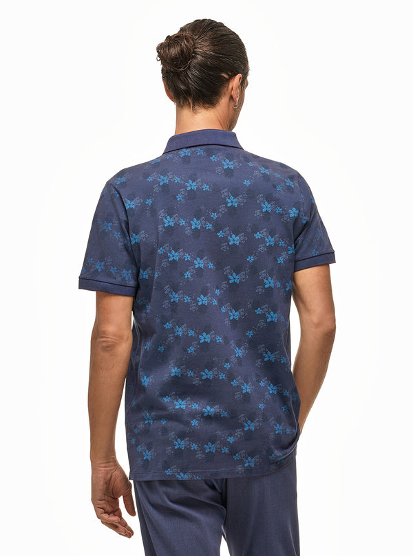 POLO DE MANGA CORTA EN PIQUET CON ESTAMPADO DE HOJAS