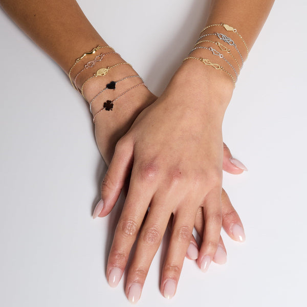 Gold-plated silver bracelet with classic four-leaf clover centerpiece