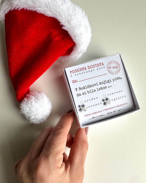 Earrings XX on a festive card for the good or naughty