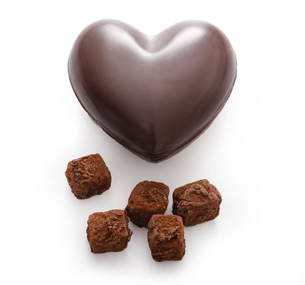 Dark chocolate heart filled with caramel truffles
