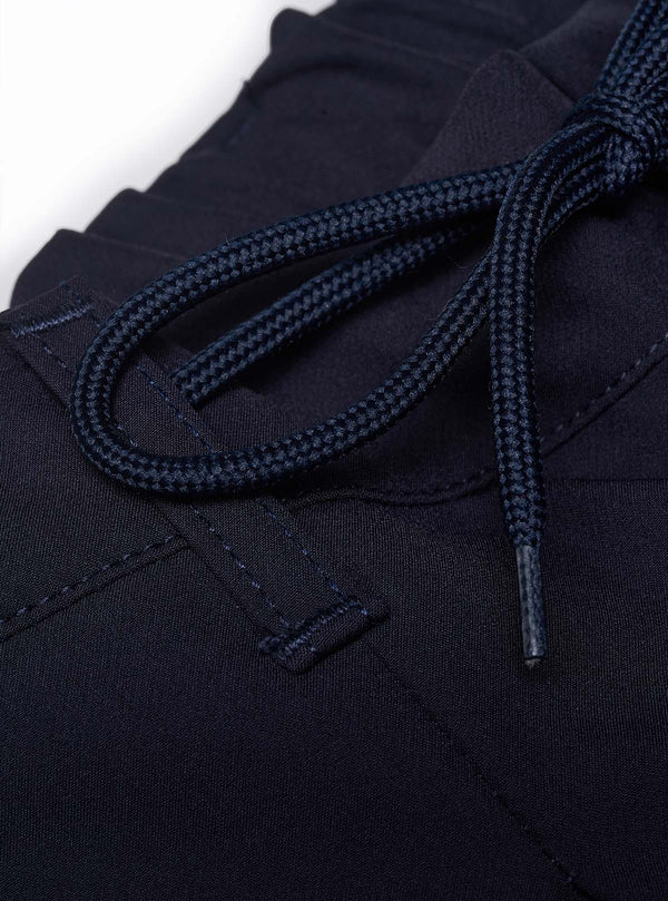 PANTALONE CON LACCI IN TESSUTO TECNICO