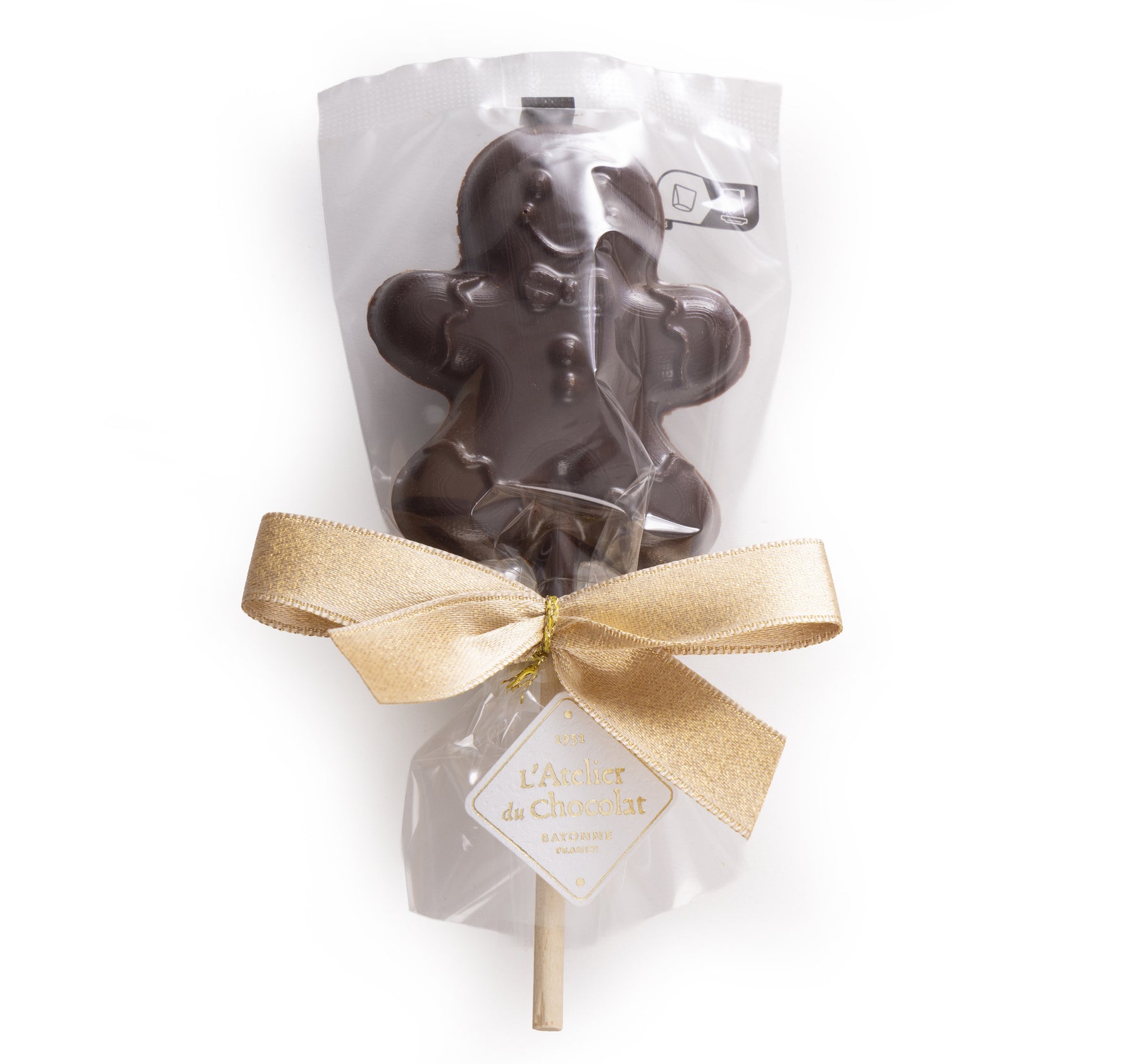 Lollipop od tamne čokolade s praline u obliku medenjaka