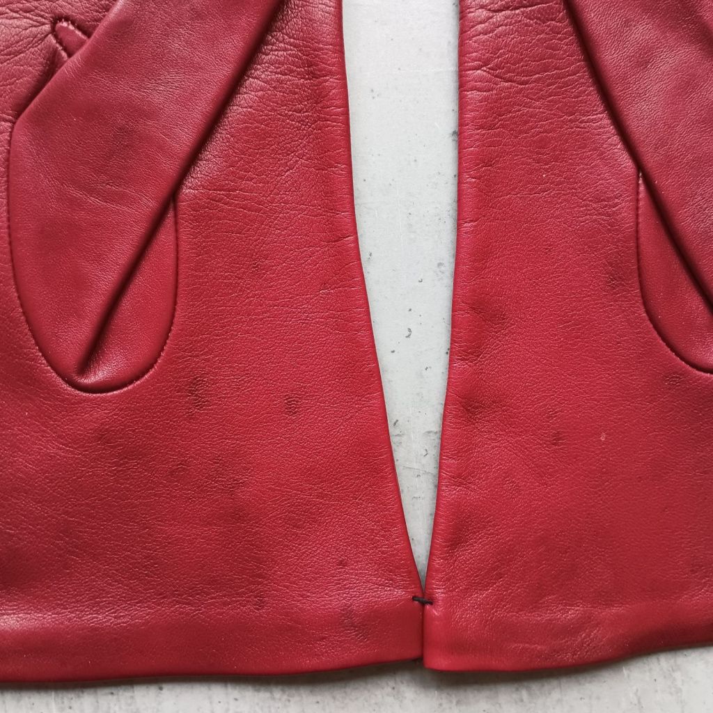 Women's leather gloves with interesting perforation