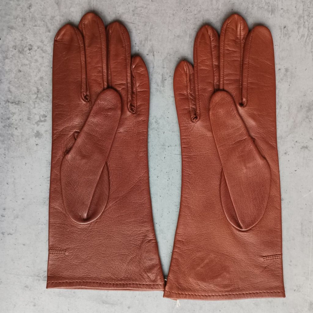 Women's leather gloves with decorative stitching and perforation