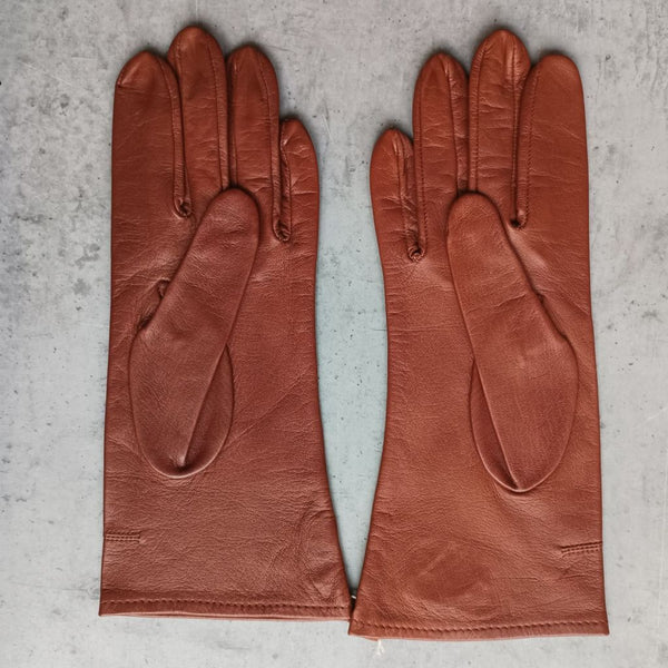 Women's leather gloves with decorative stitching and perforation