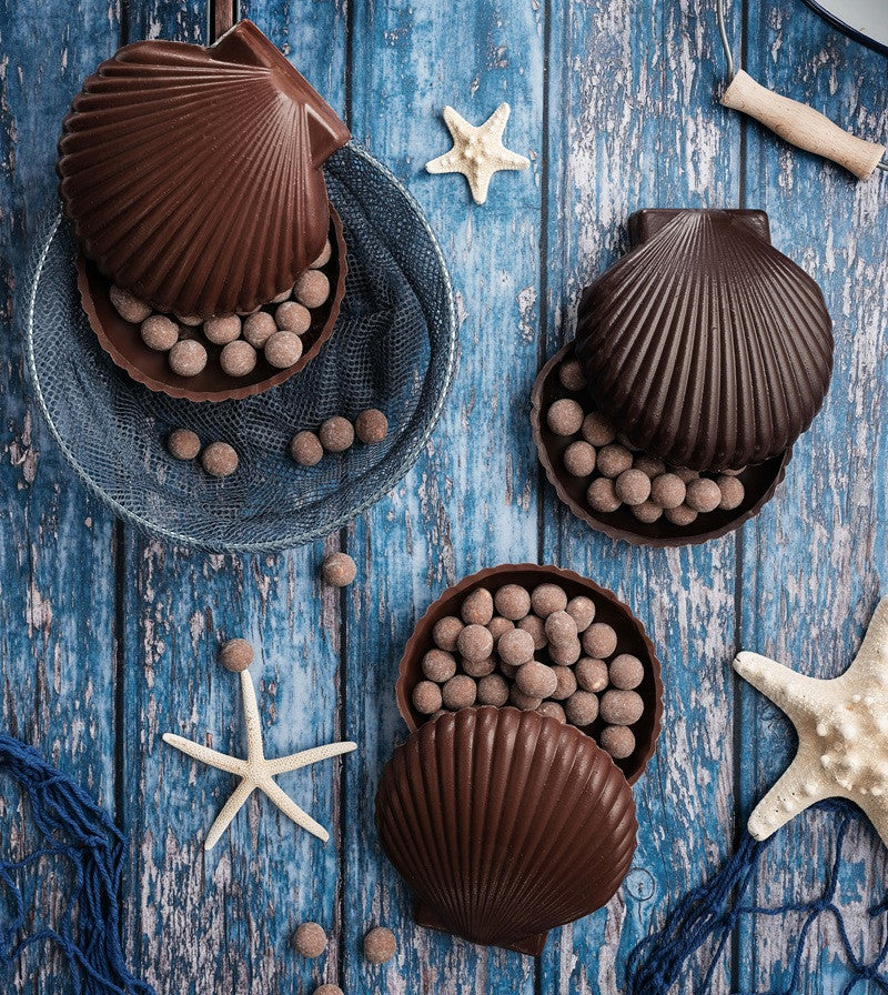 Cappesante di cioccolato con perle di cacao al latte caramellato