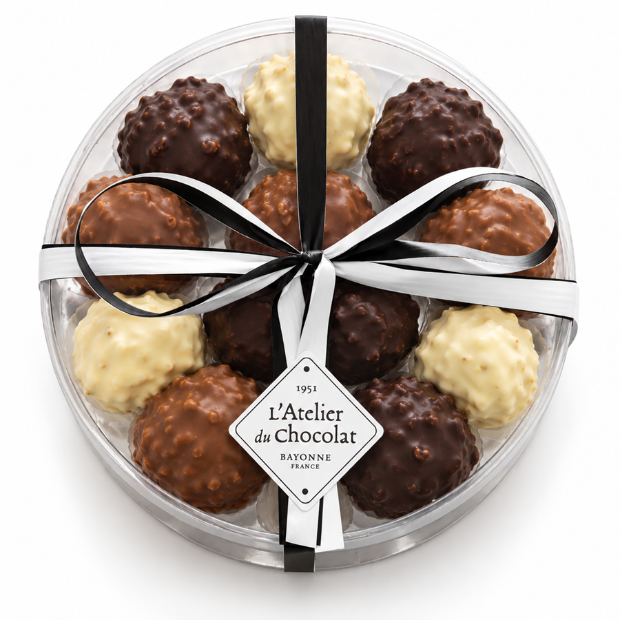 Box of 11 praline rocks in dark, white, and milk chocolate