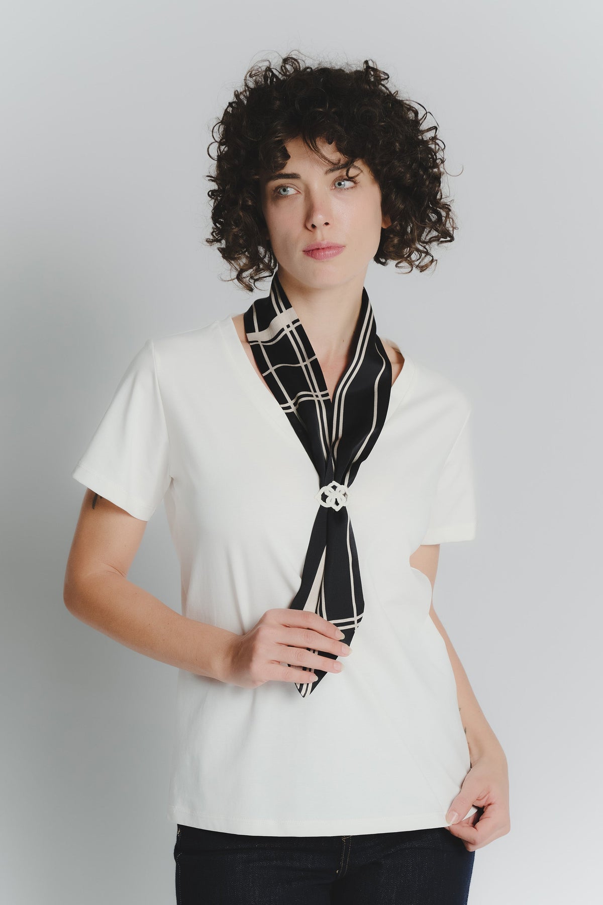 White T-shirt with Black and Beige Check Scarf