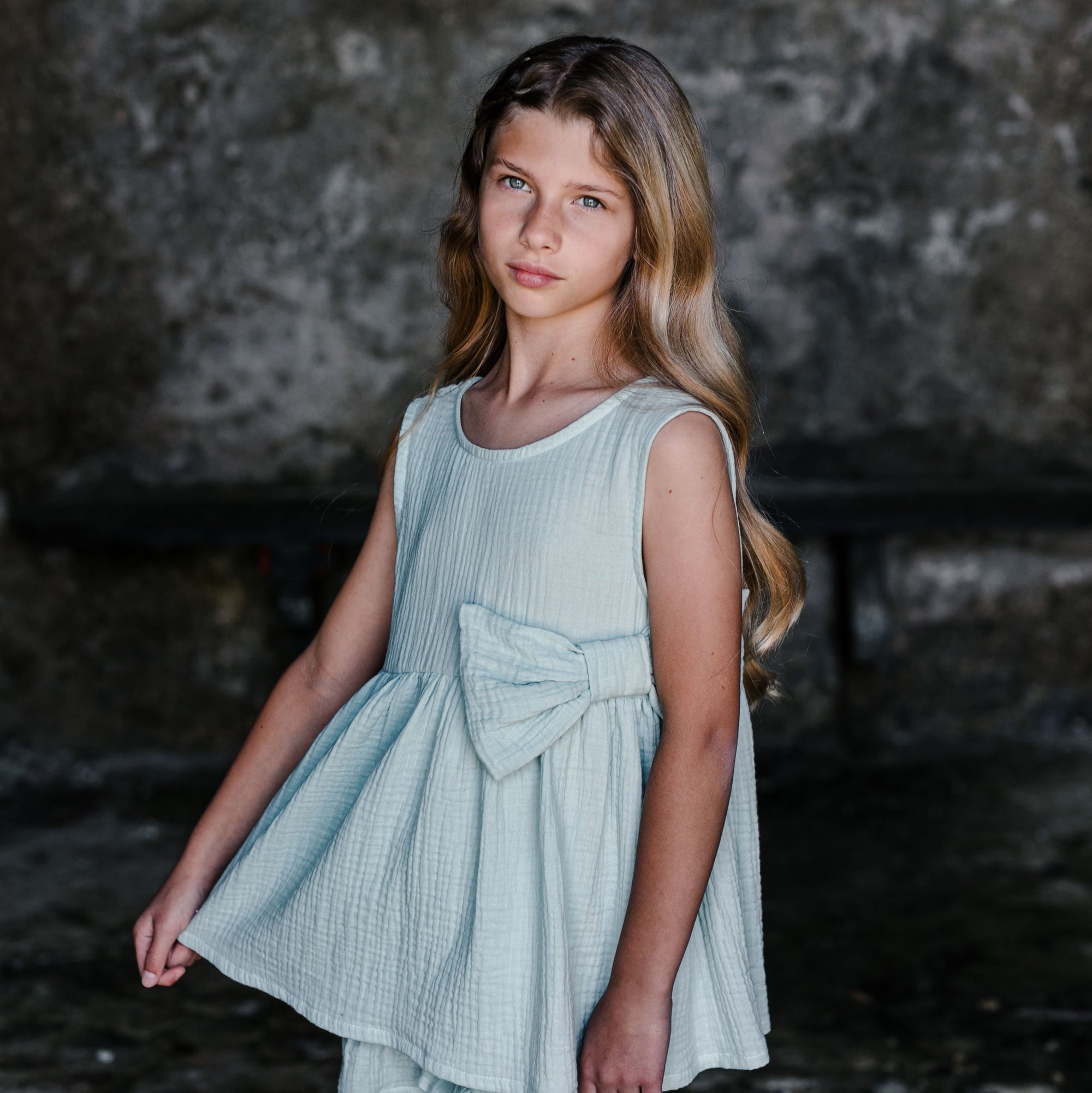TOP VERDE MENTA CON FIOCCO FRONTALE