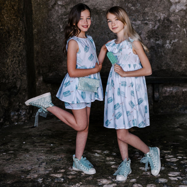 FANTASY TOP WITH CUT OUT AND BOW