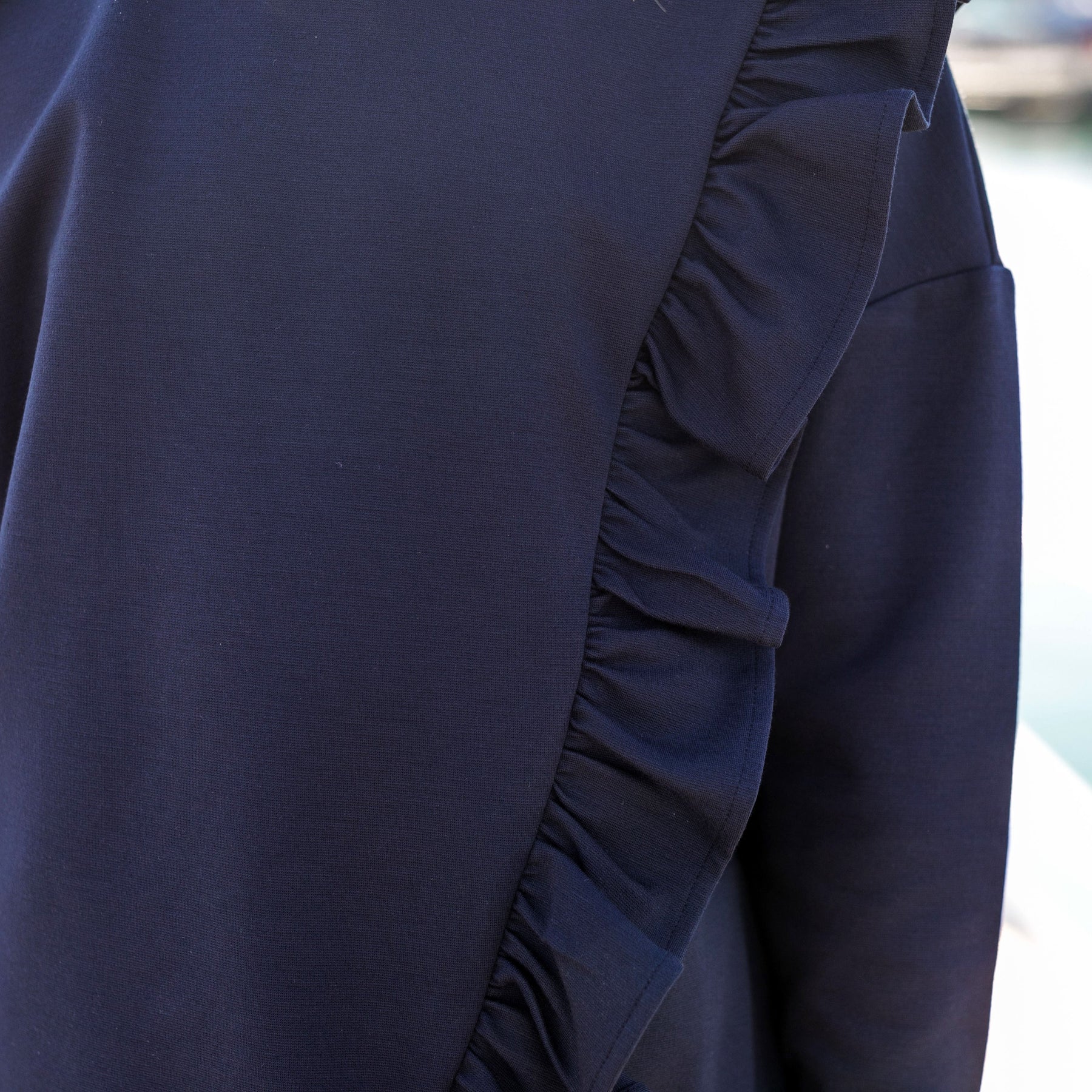 BLUE SWEATER WITH FRILLS