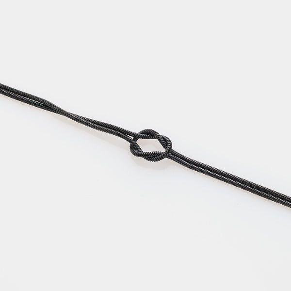 Soft infinity knot bracelet in steel