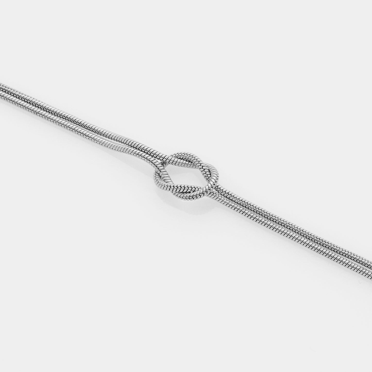 Soft infinity knot bracelet in steel