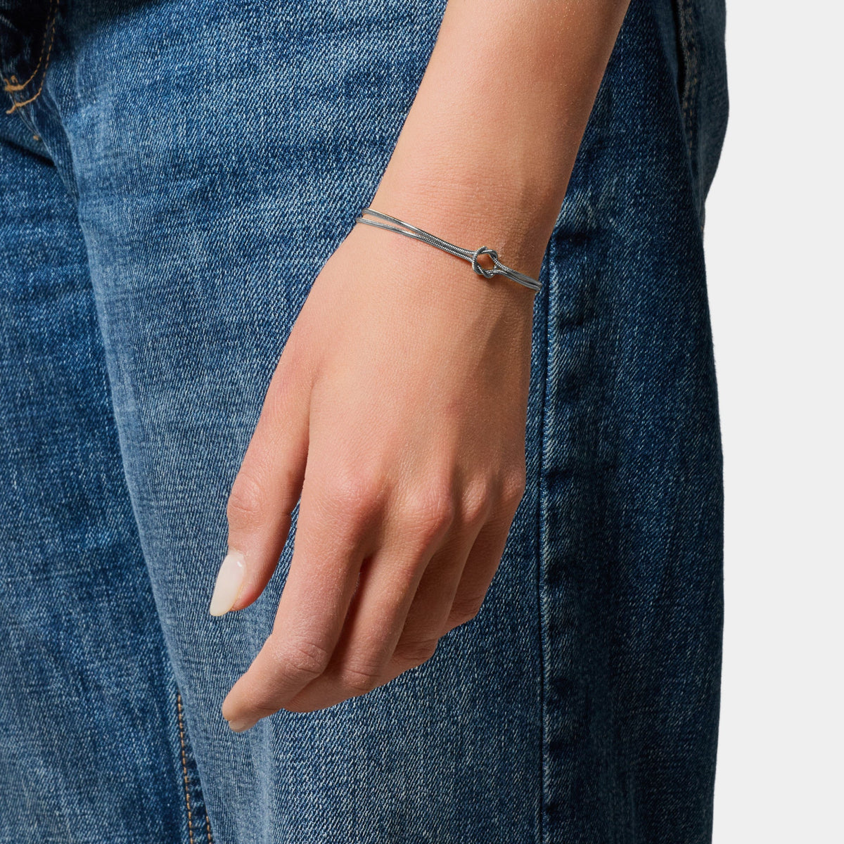 Soft infinity knot bracelet in steel