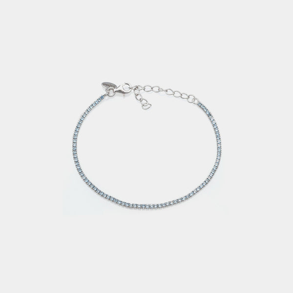 Rhodium-plated silver tennis bracelet with light blue zircons mm 1.5
