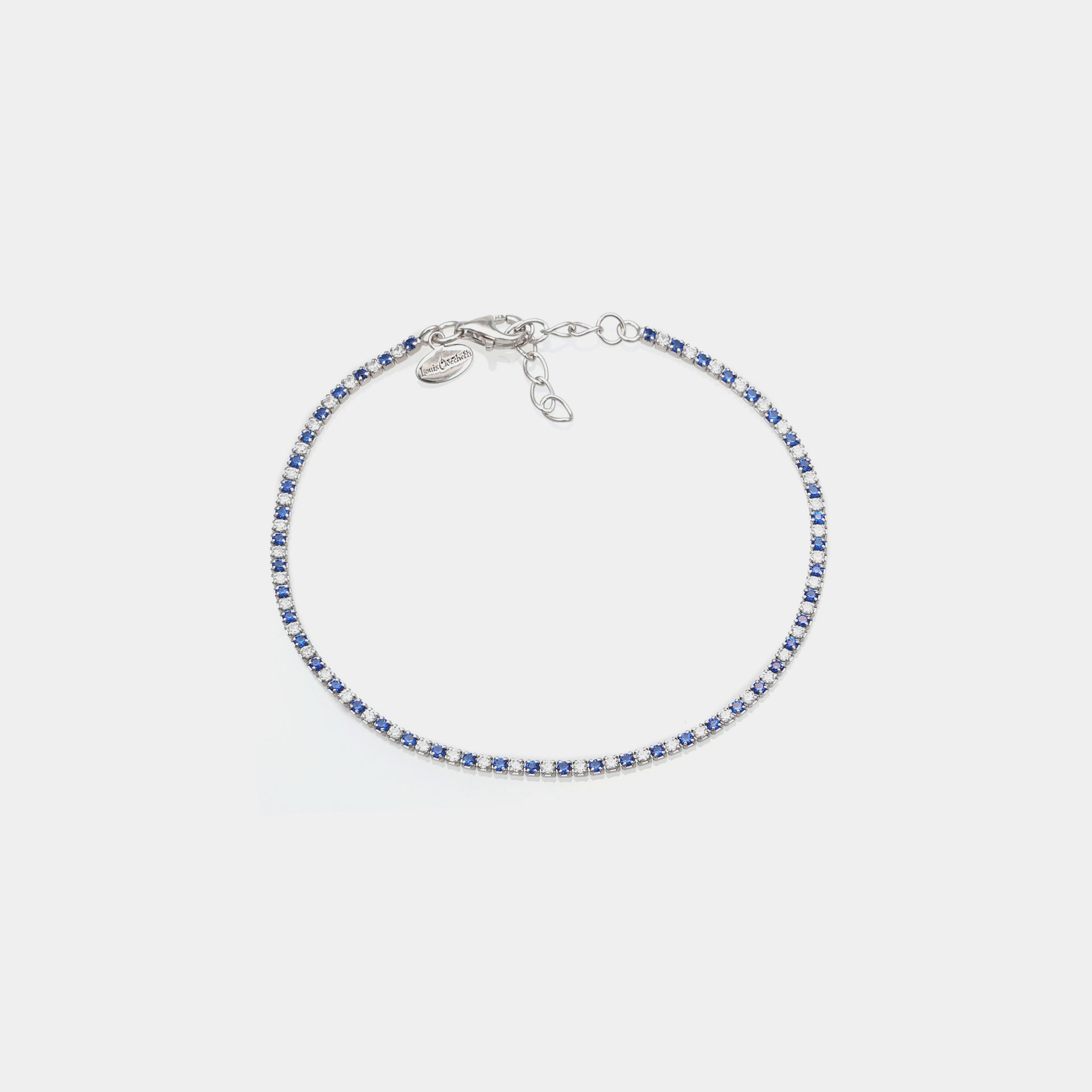 Pulsera de tenis de plata chapada en rodio con zirconitas azules y blancas de 1.5 mm