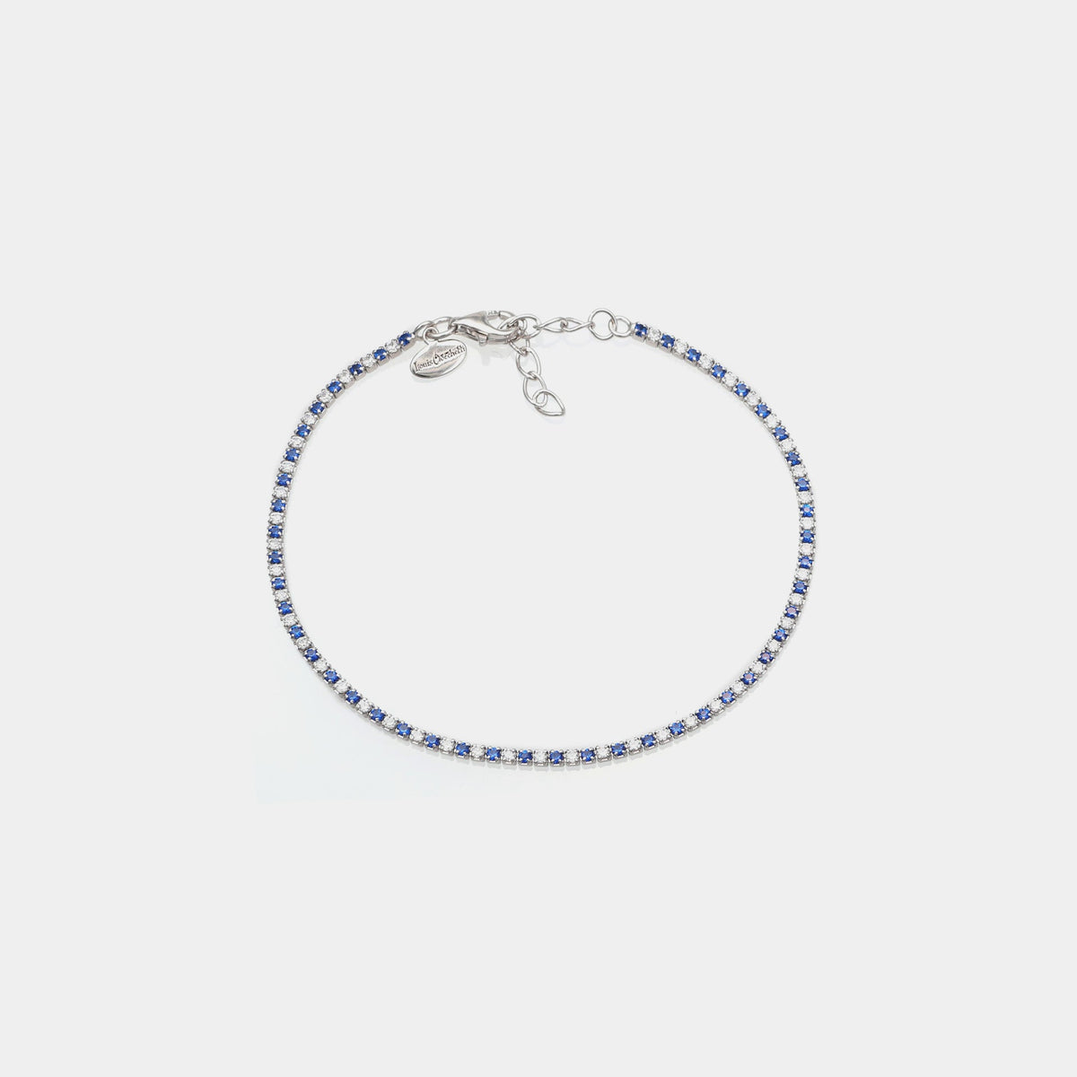 Rhodium-plated silver tennis bracelet with blue and white zirconia 1.5 mm