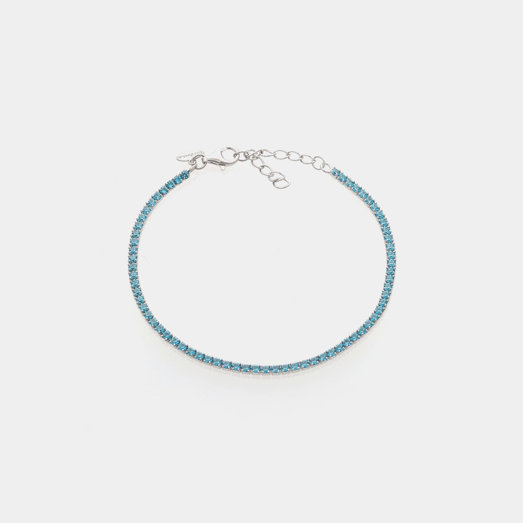 Rhodium-plated silver tennis bracelet with light blue zircons mm 2.0