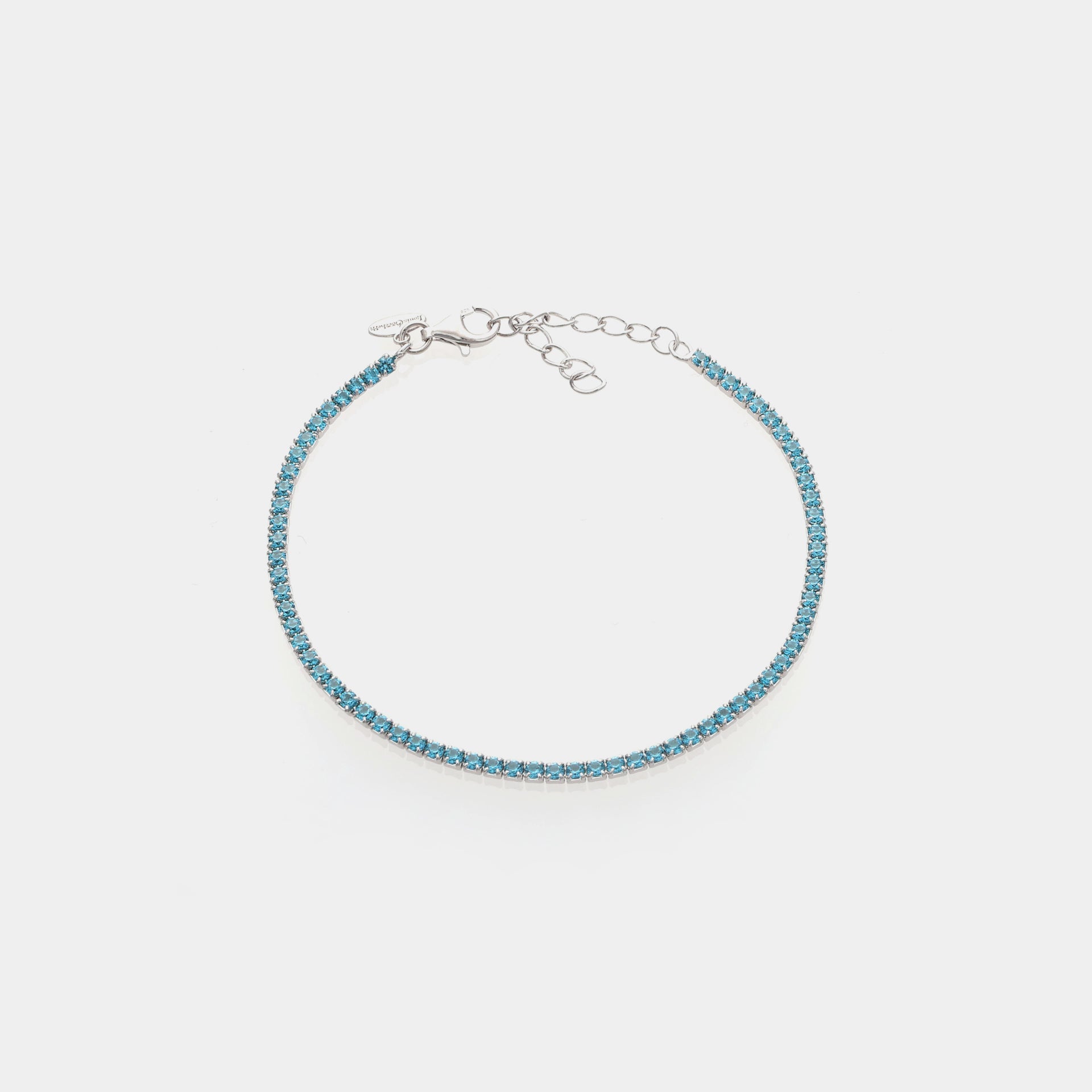 Rhodium-plated silver tennis bracelet with light blue zircons mm 2.0