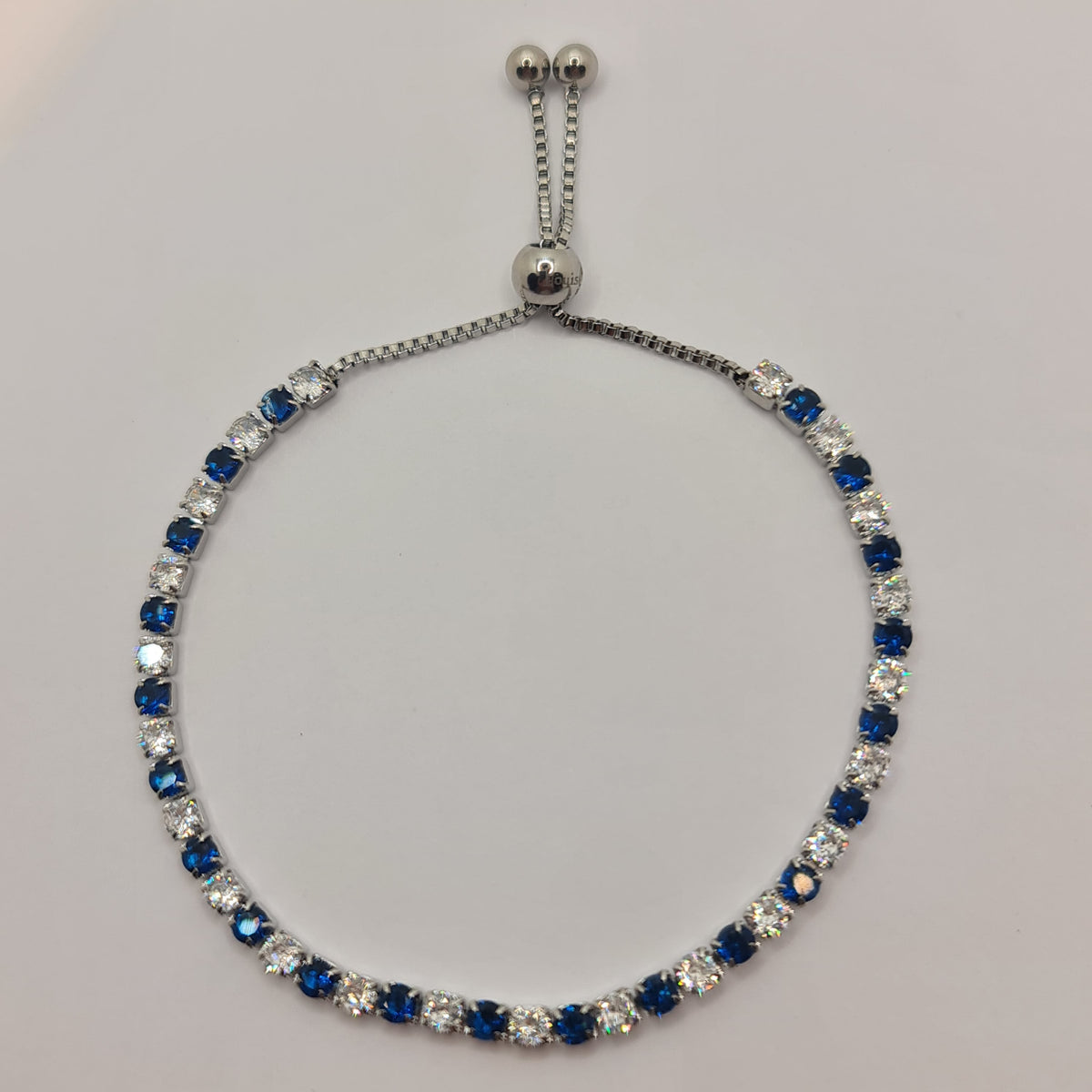 STEEL TENNIS BRACELET WITH WHITE AND BLUE ZIRCONIA 3.00 MM SLIDING CLOSURE