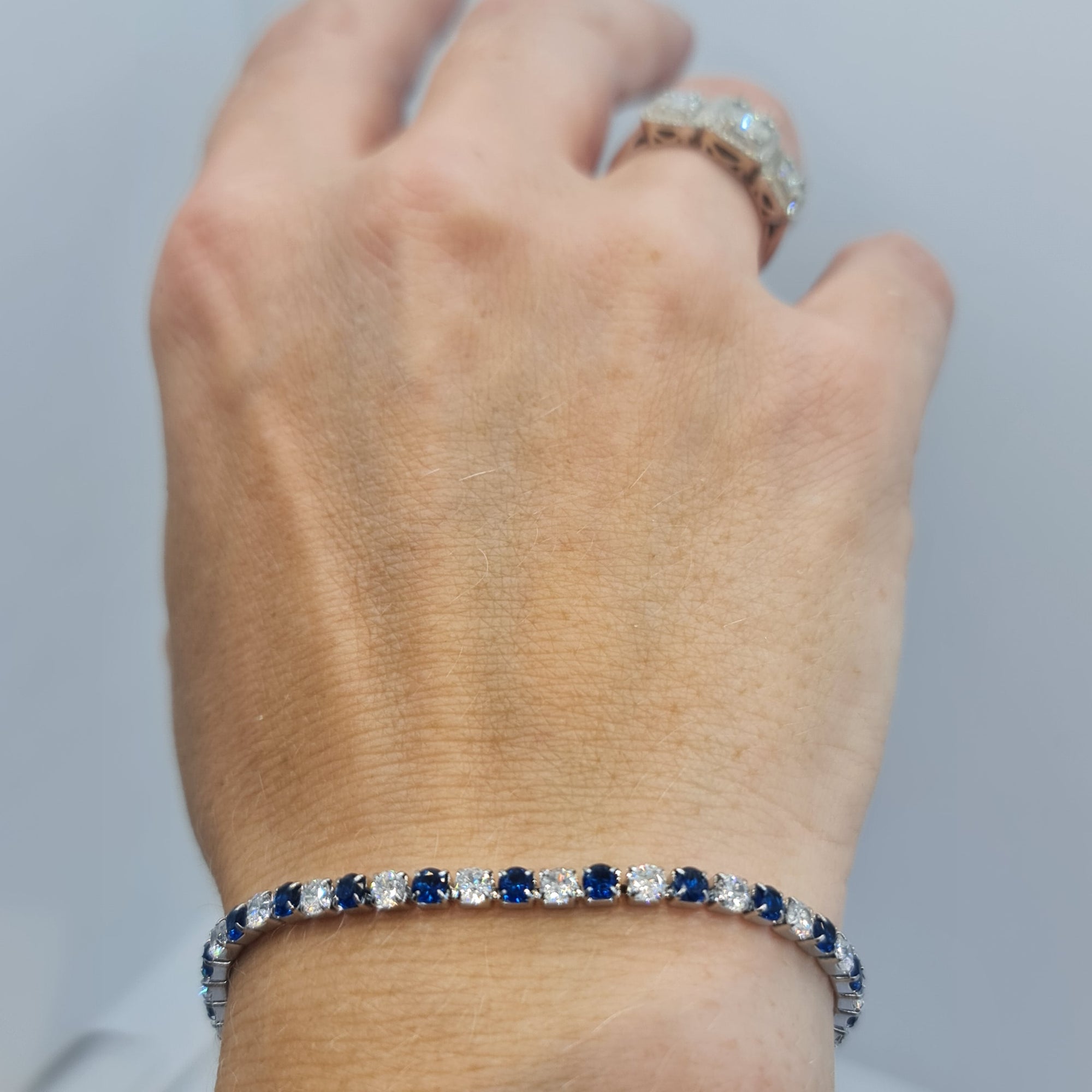 BRACCIALE ACCIAIO TENNIS E ZIRCONI BIANCHI E BLU MM 3,00 CHIUSURA A SCORRERE