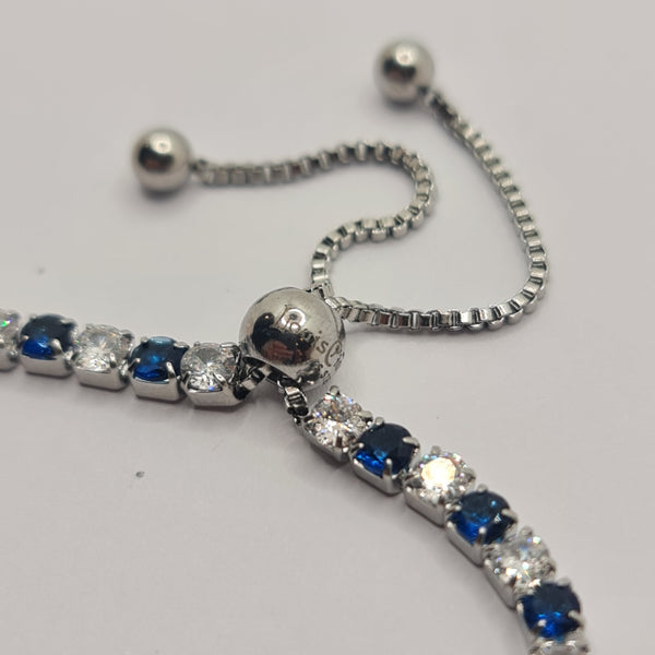 BRACCIALE ACCIAIO TENNIS E ZIRCONI BIANCHI E BLU MM 3,00 CHIUSURA A SCORRERE