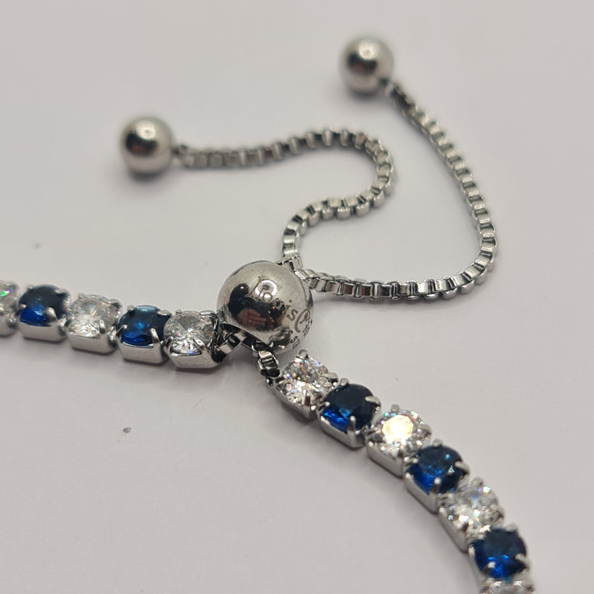 STEEL TENNIS BRACELET WITH WHITE AND BLUE ZIRCONIA 3.00 MM SLIDING CLOSURE