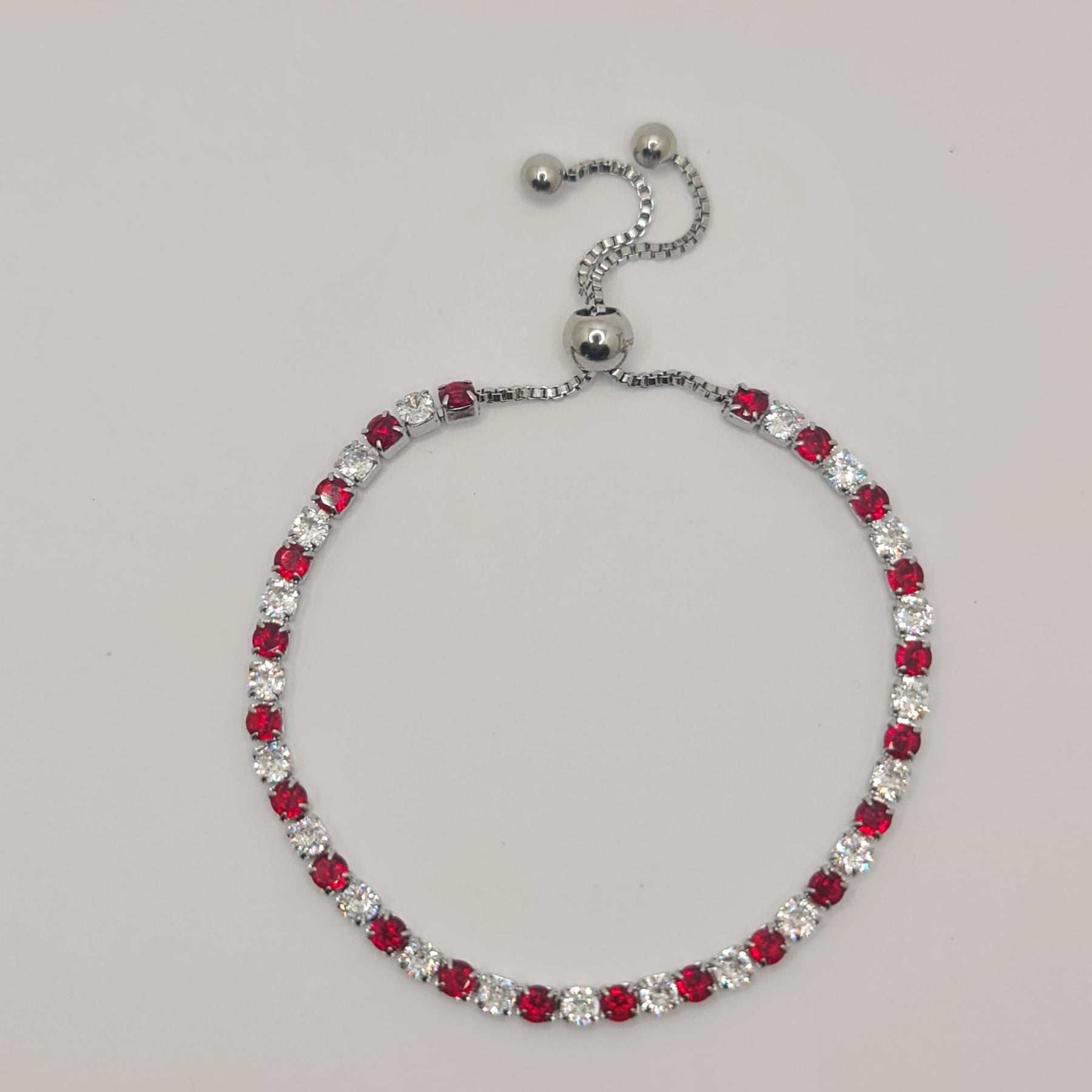 STEEL TENNIS BRACELET WITH WHITE AND RED ZIRCONS MM 3.00 SLIDING CLOSURE