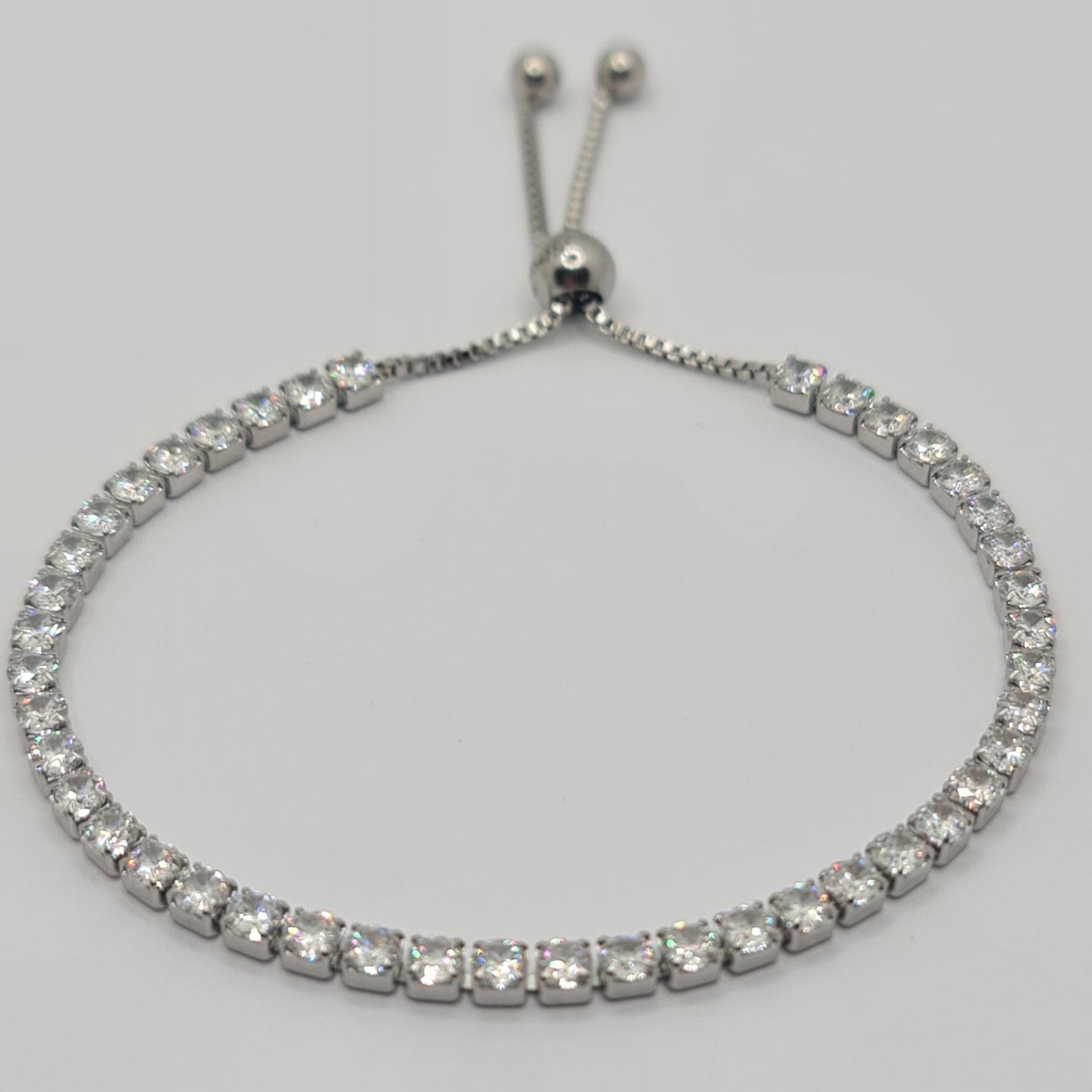 BRACCIALE ACCIAIO TENNIS E ZIRCONI BIANCHI MM 3,00 CHIUSURA A SCORRERE